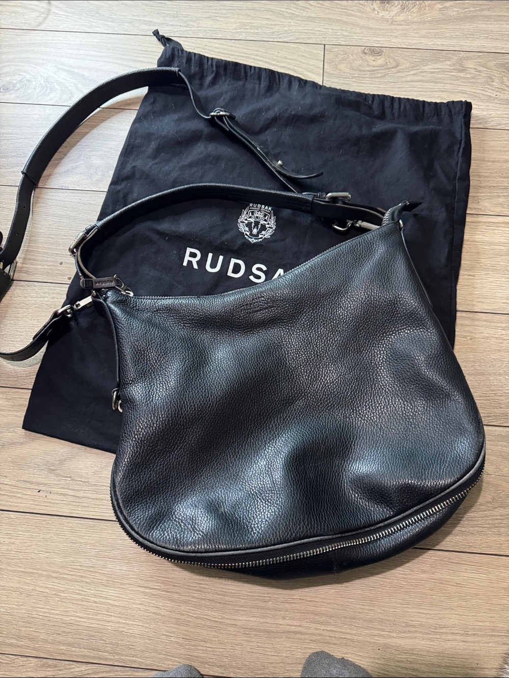 RUDSAK Black Pebbled Leather Messenger Bag with Adjustable Strap